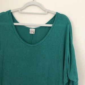 Short sleeve, long green shirt
